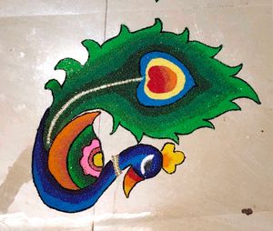 Vibrant Peacock Rangoli Art