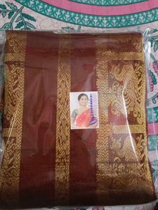 Elegant Brown And Golden Saree