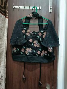 Elegant Black Saree with Floral Details And Belt