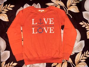 orange sweatshirt