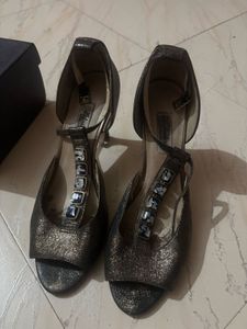 Clark’s Metallic T-Strap Heels