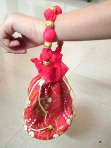 lowest price red and golden potli bag
