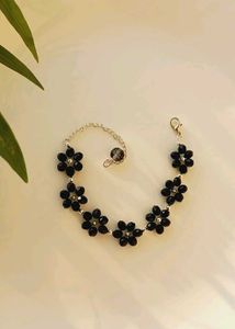 Two Bracelets And One Earrings