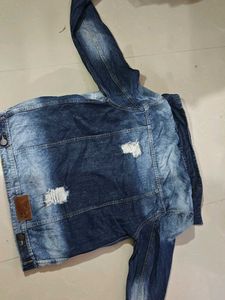 ripped denim jacket