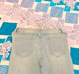 Ripped Bell Bottom Jeans