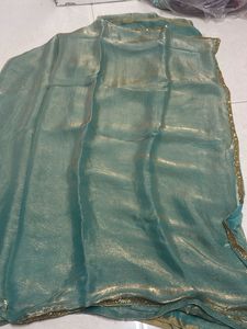 Elegant Teal Saree with Gold Details