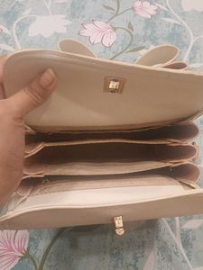 Check out this adorable pastel-colored handbag