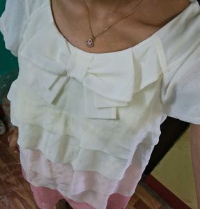 Elegant peach-white dress