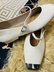 Elegant White Ballerinas