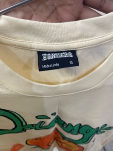 Bonkers Corner Orange Graphic Tee - Trendy!