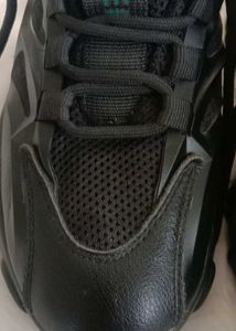 black chunky sole shoe