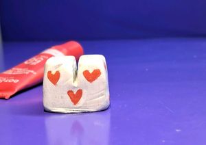 Handmade White Clay Stand with Pink Hearts