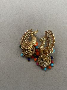 earrings , peacock style