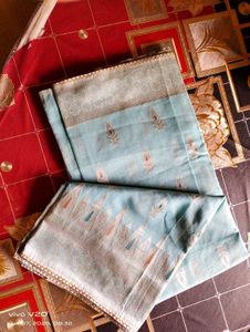 Elegant Aqua Saree with Intricate Paisley Detail