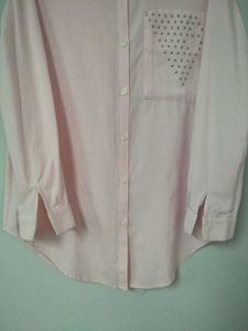 Baby pink button-down shirt