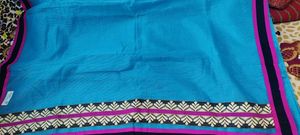 Blue color tissue cotton border lace saree