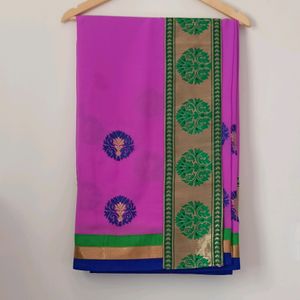 Pink Saree with Green & Blue Details