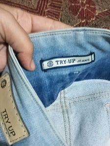 Ripped High-Waisted Jeans