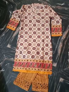 Mustard/Gold Pant And Off White Kurti.