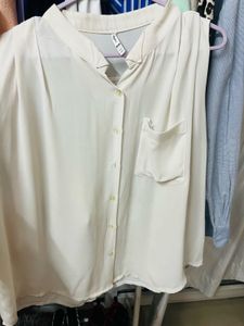 Sleeveless Button-Up Blouse