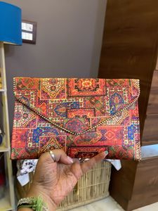 Sling Cum Clutch