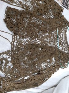 Step Sleeve Jumpsuit With Crochet Jacket.