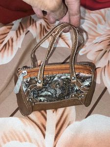 Unique Bronze-tone Handbag