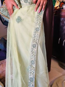 Pista Green Semi Stitched Lehenga