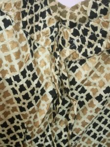 Rangmanch Beige Printed Flared Palazzo