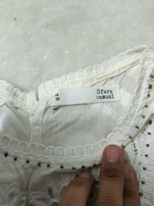 White Embroidered Peplum Top