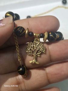 Black Beaded Bracelet with Tree Charm