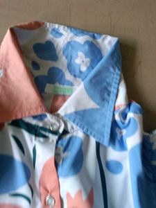 Floral top with puffed sleeves