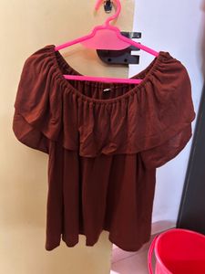 Brown off-shoulder ruffle top