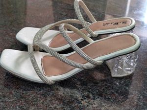white , sparky heels
