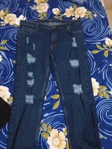 Ripped Dark Blue Jeans
