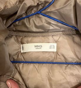 Light gold puffer jacket from Mango