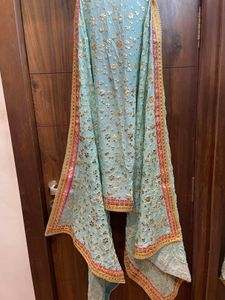 Firozi And Pink Lehenga Set