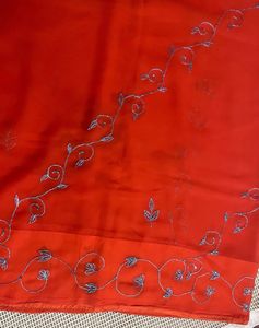 Orange Saree With Blue Shiny Embroidery