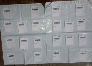 2 Shipping Bags and Twenty Labels