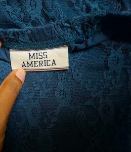 sleeveless blue dress