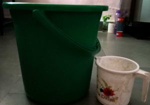 Green Bucket And White Mug