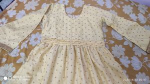 Gown with jacket.