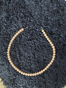 Pair of White Pearl Earrings And Two Necklaces