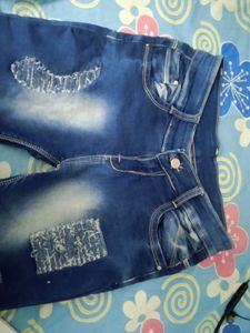 Distressed Denim Jeans