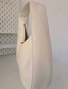 CHARLES &amp; KEITH Cream Philomena Half-Moon Bag