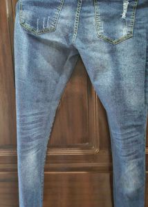 Distressed Denim Jeans