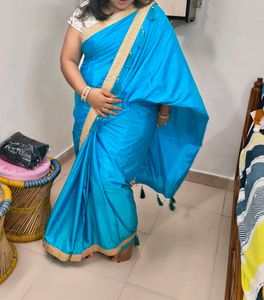 Light Firozi Saree With Golden Border