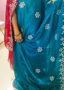 beautiful silver work blue saree and contrast red
