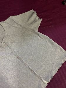 grey button top