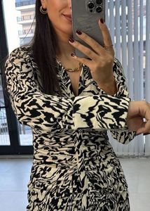 White draped shirt dress